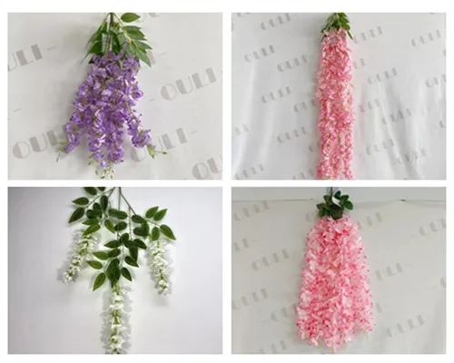 Kunstige Wisteria -grener vs vinstokker - Hva er forskjellen og hvordan du bruker dem?